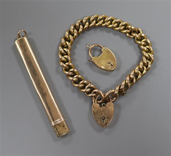 A 9ct. gold hollow curb link bracelet with two padlocks and a 9ct. gold pencil holder and case.